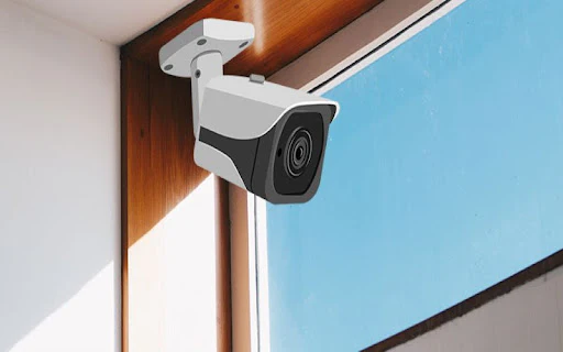 Ventana vigilada por cámara de seguridad